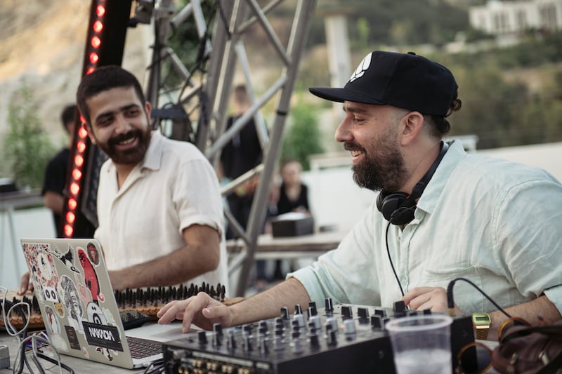 Boshoco, right, playing a set in Damascus. Photo: Hasan Belal