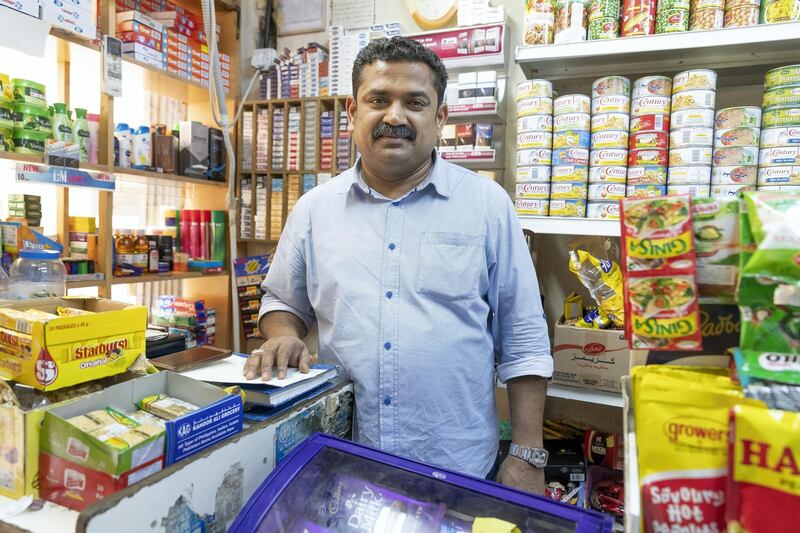 DUBAI, UNITED ARAB EMIRATES. 24 APRIL 2018. Neyas Kadankandy Mangodon comments about the social media posts showing a model posing in Satwa from  his Baqala / Grocery shop in Satwa called Kahoor Ali Grocery where the original pictures were taken. (Photo: Antonie Robertson/The National) Journalist: Anna Zacharias. Section: National.