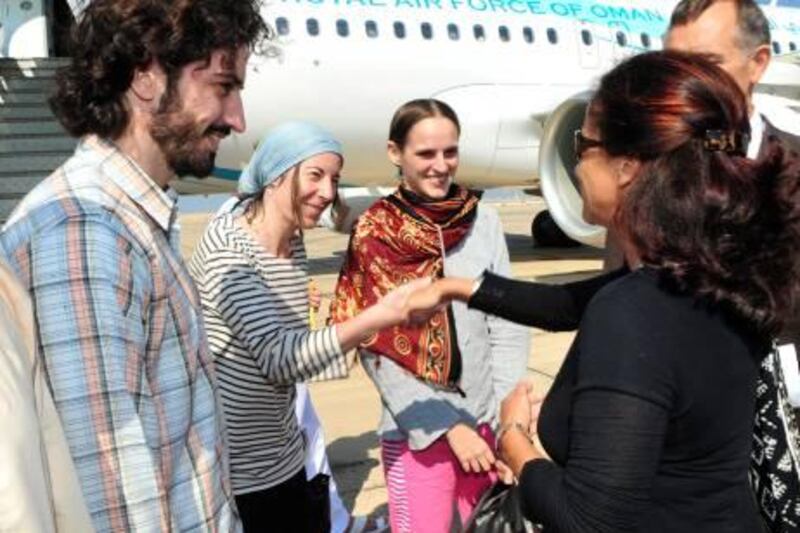 France's ambassador to Oman, Malika Berak, receives three French aid workers held hostage in Yemen since May upon their arrival in Muscat November 14, 2011. Three French aid workers held hostage by Yemeni tribesmen since May 28 have been freed after neighbouring Oman negotiated their release, paying an unspecified sum to their captors on behalf of the French government, a Yemeni tribal source said.   REUTERS/Sultan Hassani (OMAN - Tags: POLITICS CIVIL UNREST SOCIETY) *** Local Caption ***  AJS02_YEMEN-FRANCE-_1114_11.JPG