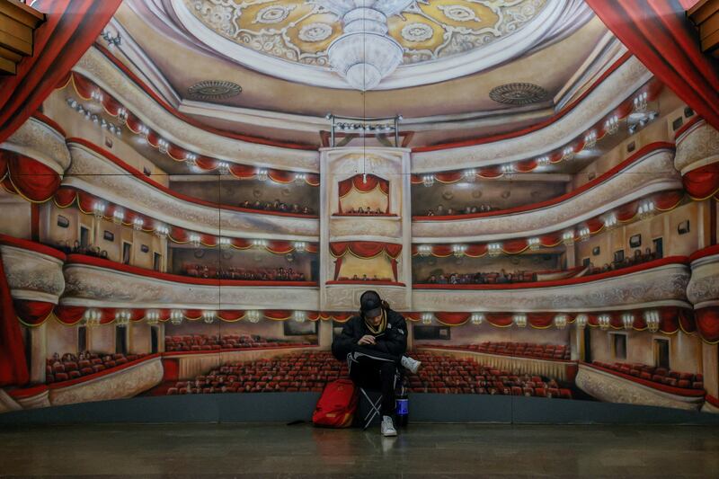 A man takes shelter in a metro station during an air-raid alert in Kyiv. Reuters