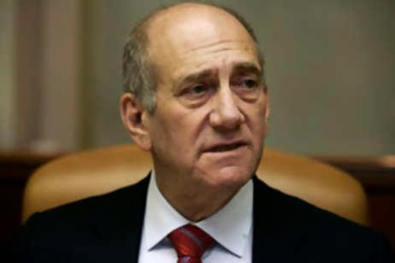 ** FILE ** In this file photo dated May 11, 2008, Israeli Prime Minister Ehud Olmert attends the weekly cabinet meeting in Jerusalem. Detectives questioned Prime Minister Ehud Olmert on Thursday, Oct. 2, 2008, for the eighth time over corruption allegations that forced him to resign. (AP Photo/Sebastian Scheiner, File) *** Local Caption ***  JRL101_MIDEAST_ISRAEL_PALESTINIANS_OLMERT.jpg