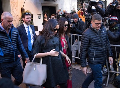 Meghan, Duchess of Sussex, leaves the Surrey Hotel ahead of her baby shower at the Mark Hotel on Tuesday, Feb. 19, 2019, in New York. (AP Photo/Kevin Hagen)