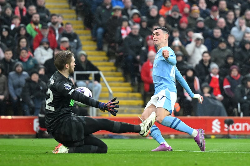 LIVERPOOL RATINGS: Forced into early saves from Alvarez and De Bruyne strikes. Got part of body to Stones’ shot for opener but couldn’t keep it out. Big save from Foden immediately after Liverpool’s goal. Getty Images