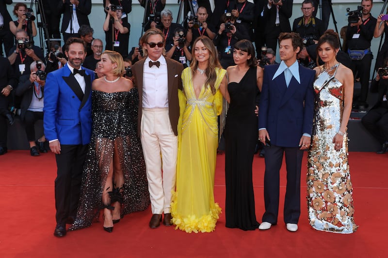 The 'Don't Worry Darling' cast, from left: Nick Kroll, Florence Pugh, Chris Pine, director Olivia Wilde, Sydney Chandler, Harry Styles and Gemma Chan, at the premiere during the Venice Film Festival on September 5. AP Photo