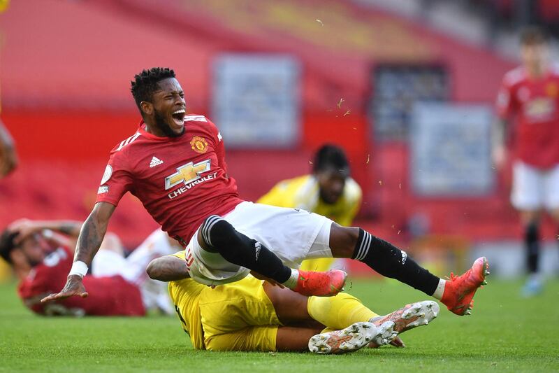 United midfielder Fred is challenged by Fulham's Mario Lemina. AFP