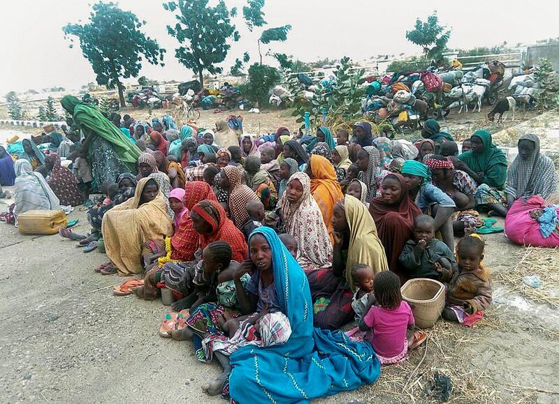 epa06413768 Some of the 700 persons rescued from Boko Haram lslamic militants by Nigerian Army, in Monguno, Nigeria, 02 January 2018. According to the Deputy Director, Army Public Relations over 700 persons abducted by Boko Haram insurgents had escaped from their captors and were received by the 242 Battalion of Nigeria troops in Monguno. The abductees comprising men, women and children were forced to work as farm labourers by the insurgents.  EPA/DEJI YAKE BEST QUALITY AVAILABLE