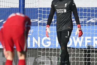 Soccer Football - Premier League - Leicester City v Liverpool - King Power Stadium, Leicester, Britain - February 13, 2021 Liverpool's Alisson reacts after Leicester City's Harvey Barnes scores their third goal Pool via REUTERS/Michael Regan EDITORIAL USE ONLY. No use with unauthorized audio, video, data, fixture lists, club/league logos or 'live' services. Online in-match use limited to 75 images, no video emulation. No use in betting, games or single club /league/player publications. Please contact your account representative for further details.