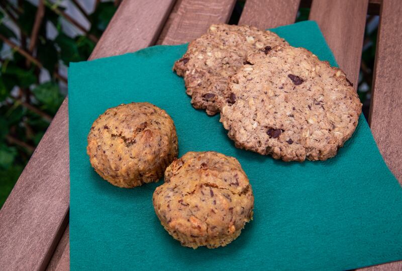 Tahini and oat chocolate chop cookies, right, and pineapple and ginger muffins from Veghana
