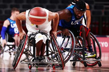 Tokyo 2020 Paralympic Games - Wheelchair Basketball - Men's Preliminary Round Group B - Algeria v United States - Ariake Arena, Tokyo, Japan - August 30, 2021.  Rafik Mansouri of Algeria in action with Matt Scott of the United States.  REUTERS / Marko Djurica     TPX IMAGES OF THE DAY