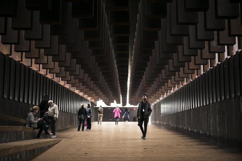 MONTGOMERY, AL - APRIL 26: Veric Lang, 19, visits the National Memorial For Peace And Justice on April 26, 2018 in Montgomery, Alabama. "Itâs powerful," Lang said. "Seeing the list of names and the reasons why people were killed, it's eye opening to know what society was like back then. It make me uneasy to know what this is what my people went through. Iâm glad times have changed now, but there still a lot more we have to do." The memorial is dedicated to the legacy of enslaved black people and those terrorized by lynching and Jim Crow segregation in America. Conceived by the Equal Justice Initiative, the physical environment is intended to foster reflection on America's history of racial inequality.   Bob Miller/Getty Images/AFP