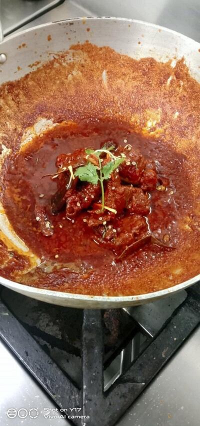 Although it has adapted, laal maas was originally cooked on wooden stoves. Photo: Rakesh Kumar 