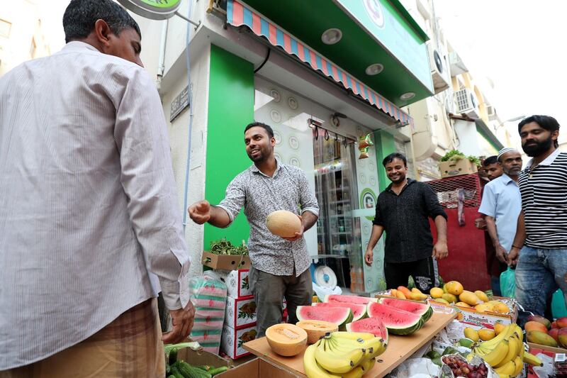 Dubai, United Arab Emirates - May 16, 2019: People prepare for Iftar. Mosque series for Ramdan. Lootah Masjid Mosque is an old mosque in Deira. Thursday the 16th of May 2019. Deira, Dubai. Chris Whiteoak / The National