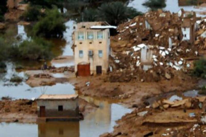 An aerial view shows water flooding an area in the eastern Yemeni province of Hadramaut on October 25, 2008. Aid operations swung into higher gear in Yemen today after floods killed at least 58 people and six more died from lightning strikes during two days of fierce storms. Both Hadramaut and Mahra provinces have been officially declared disaster zones. AFP PHOTO/KHALED FAZAA *** Local Caption ***  562148-01-08.jpg
