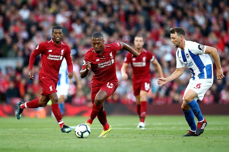LIVERPOOL, ENGLAND - AUGUST 25:  Daniel Sturridge of Liverpool controls the ball as Dale Stephens of Brighton and Hove Albion looks on during the Premier League match between Liverpool FC and Brighton & Hove Albion at Anfield on August 25, 2018 in Liverpool, United Kingdom.  (Photo by Jan Kruger/Getty Images)