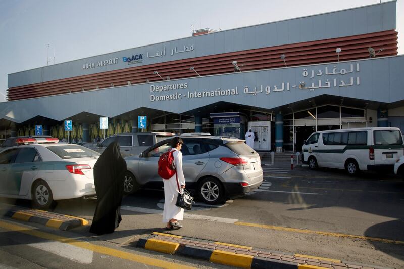 In this Thursday, Aug. 22, 2019, photo, Saudi passengers enter the departure terminal of Abha airport, south of Saudi. Saudi Arabia said early Thursday, Aug. 29, 2019, that a Houthi strike hit Abha regional airport, causing no injuries. The Houthis said they attacked the facility with a Quds-1 cruise missile late Wednesday. Attacks targeting that airport over recent weeks have wounded dozens. (AP Photo/Amr Nabil)