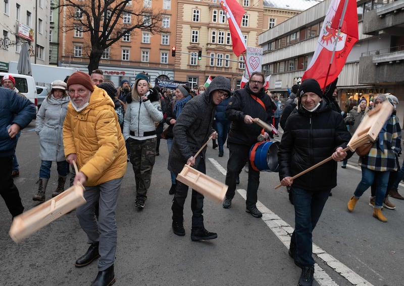 Protesters take part in a demonstration against Covid-19 health restrictions in Austria, which became the first EU country to say it would make vaccinations mandatory. AFP