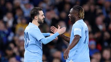 Bernardo Silva of Manchester City, left, celebrates scoring his team's second goal with teammate Jeremy Doku. Getty Images