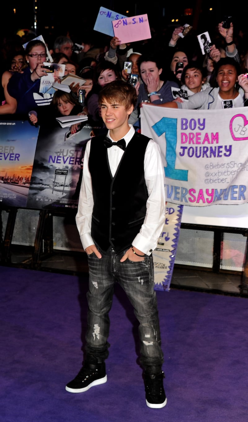 In a waistcoat and bow tie, the singer attends the premiere of 'Justin Bieber: Never Say Never' at Cineworld 02 Arena on February 16, 2011, in London. Getty Images