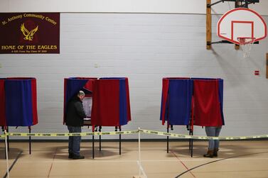  Voters cast their ballots in a voting booth setup in a community centre on February 11, 2020 in Manchester, New Hampshire. Joe Raedle / Getty Images/ AFP 