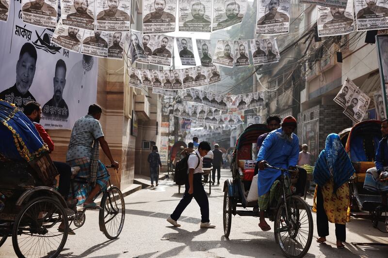 A Dhaka street is decked with campaign posters ahead of this weekend's general election in Bangladesh. Reuters