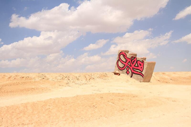 Photos of El Seed from his upcoming book, Lost Walls. This is in Tunisia.

CREDIT: Courtesy El Seed