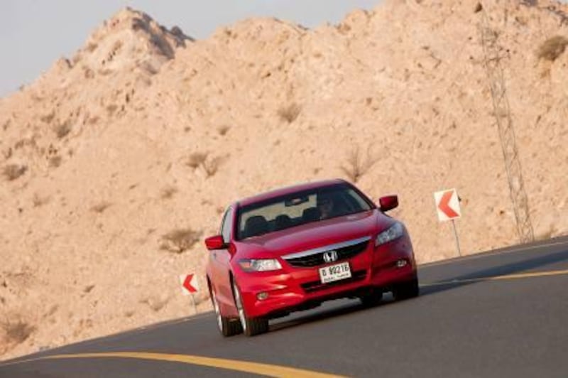 January 08:  Exterior of a red Honda Accord V6, 2011 model photograped for a review by Neil Vorano in the Motoring section on January 08, 2011 in Dubai, United Arab Emirates (Photo No Byline)