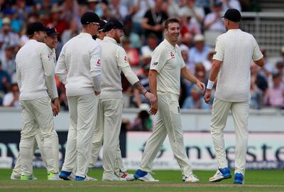 Cricket - England vs South Africa - Fourth Test - Manchester, Britain - August 5, 2017   England's Toby Roland-Jones celebrates with team mates after bowling out South Africa's Hashim Amla   Action Images via Reuters/Jason Cairnduff