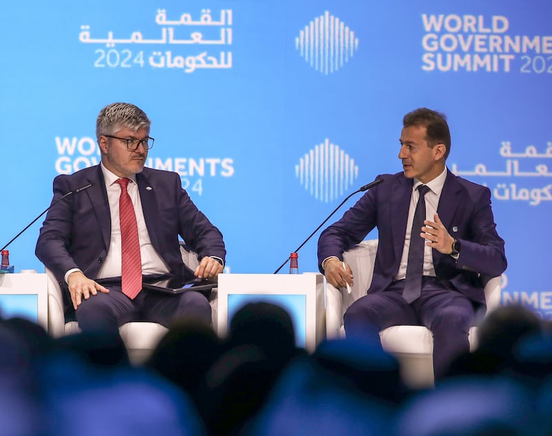 Juan Salazar (left), secretary general of the International Civil Aviation Organisation and Guillaume Faury, chief executive of Airbus, speak at an aviation session in the World Governments Summit on Monday. Victor Besa / The National