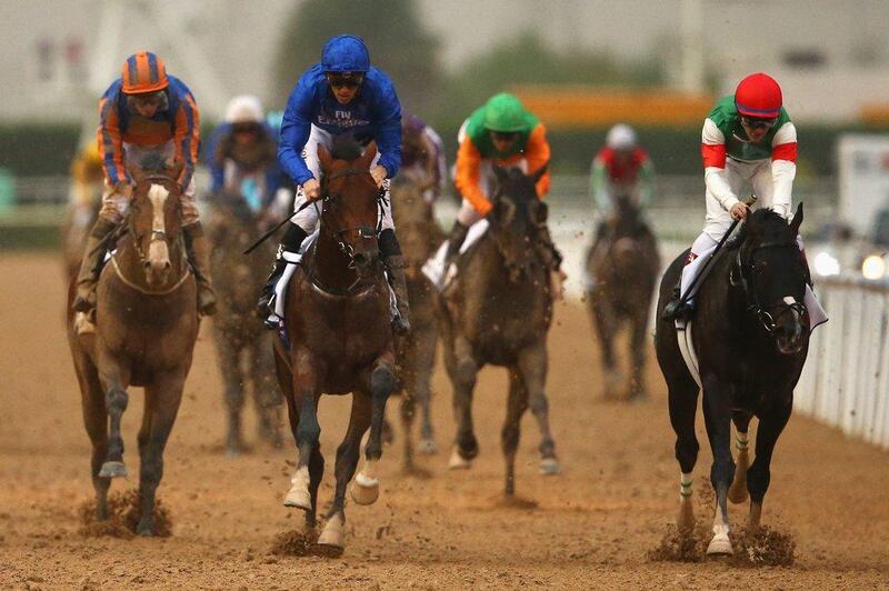 Christophe Soumillon (in blue) riding Thunder Snow beats Christophe Lemaire, right, riding Epicharis in the UAE Derby. Francois Nel / Getty Images