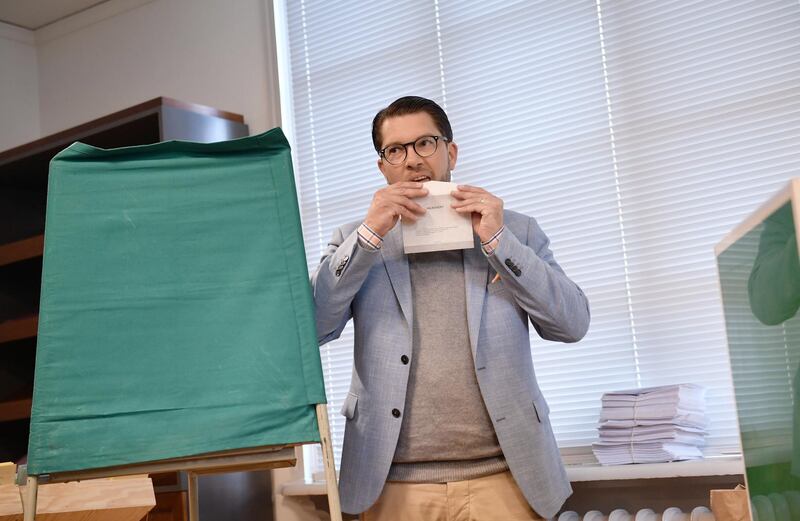 epaselect epa07007817 Jimmie Akesson, leader of the right-wing nationalist Sweden Democrats (SD) party, seals his ballot at a polling station in the Stockholm City Hall, in Stockholm, Sweden 09 September 2018. About 7.5 million Swedes are eligible to vote in the countryâ€™s general elections on 09 September that are expected to see huge gains for the far-right Sweden Democrats (SD) party and losses for the ruling coalition of Social Democrtas and the Green party. The previous election campaign has been dominated by a controversial debate over the countryâ€™s immigration policy.  EPA/STINA STJERNKVIST SWEDEN OUT