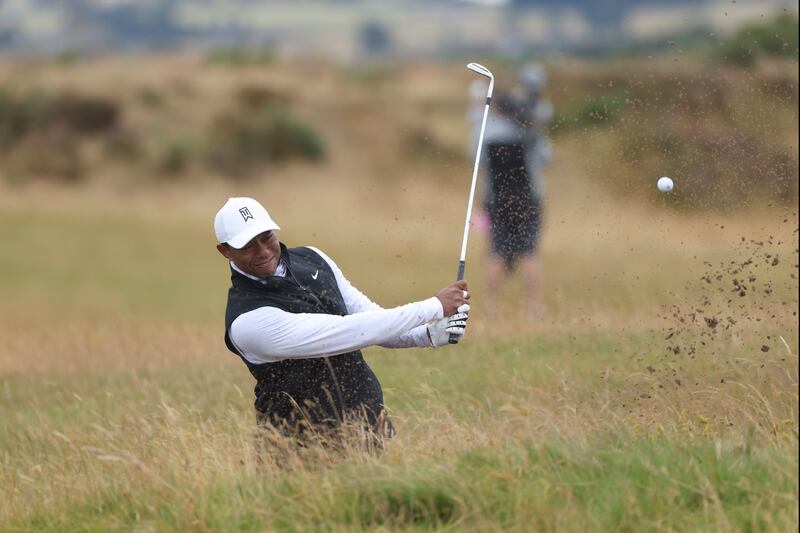 Tiger Woods plays out of a bunker on the sixth hole during the second round of the The Open. AP