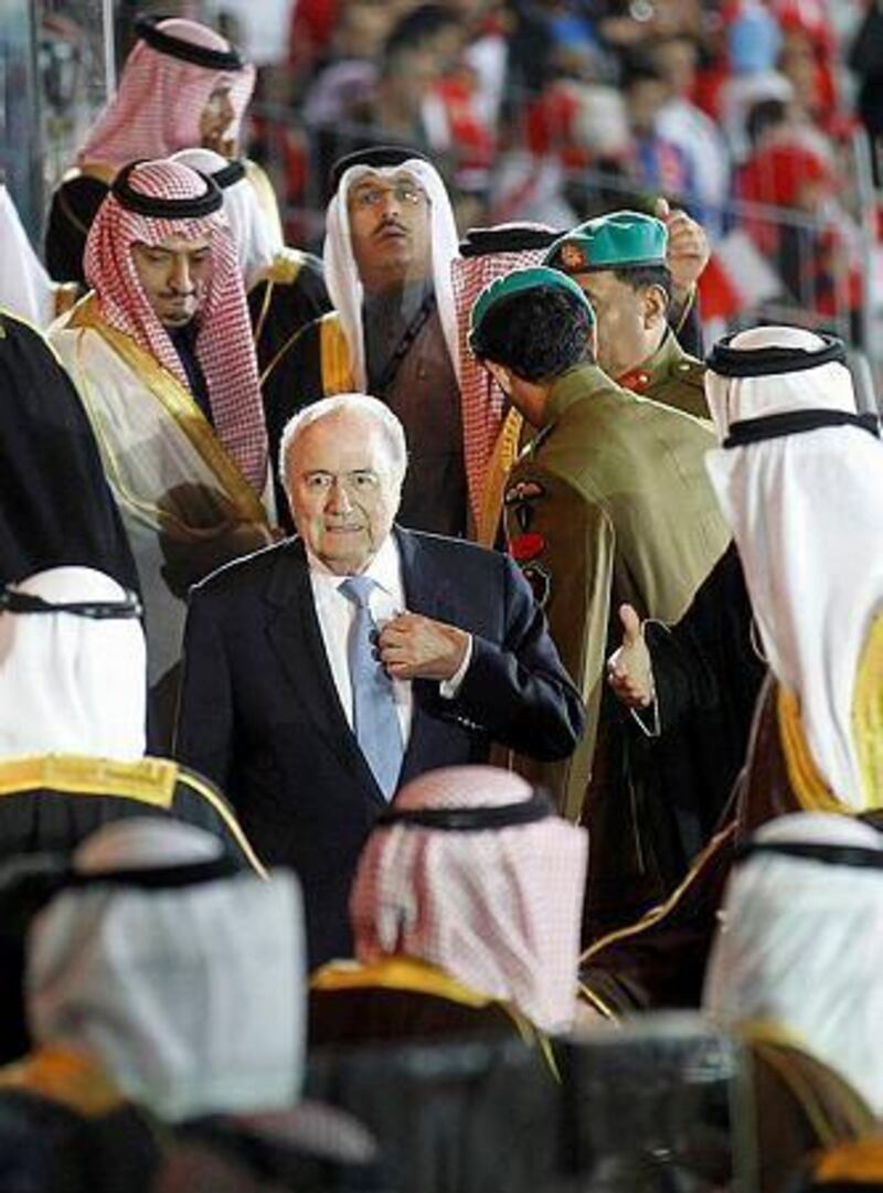 Fifa president Sepp Blatter, centre, shown here attending the opening ceremony of the Gulf Cup football tournament in Manama on January 5, 2013, pledged his support to Qatar and hosting the 2022 World Cup on Sunday. REUTERS/Mohammed Dabbous