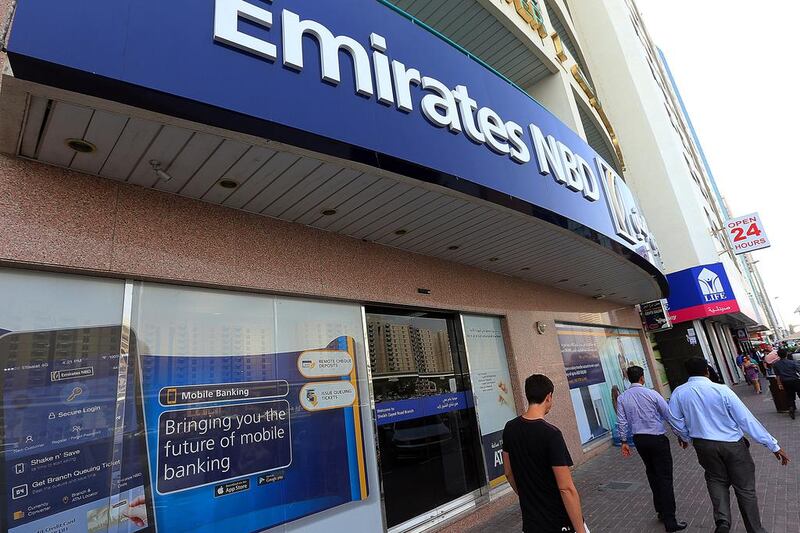 Emirates NBD and other Dubai lenders will help customers manage their finances during the coronavirus crisis and its economic impact. Satish Kumar / The National