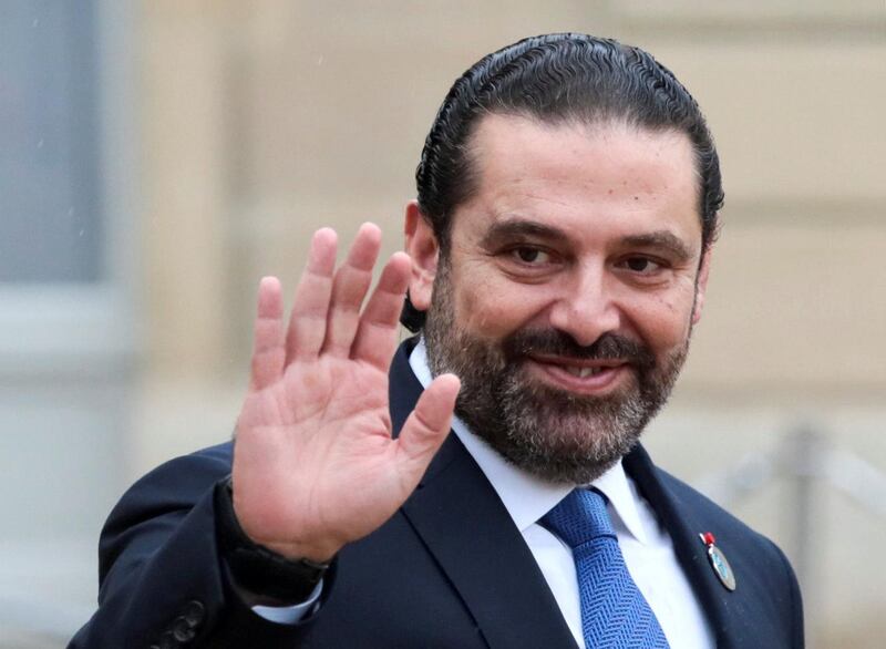 FILE PHOTO: Lebanese Prime Minister Saad al-Hariri waves as he leaves after a lunch at the Elysee Palace as a part the commemoration ceremony for Armistice Day, 100 years after the end of World War One, in Paris, France, November 11, 2018.  REUTERS/Reinhard Krause/File Photo