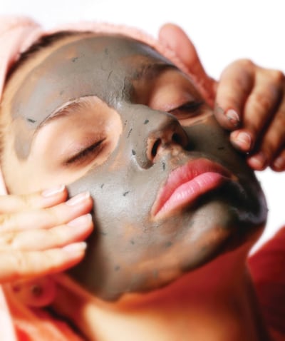 Beauty-spa. Applying of cosmetic mud mask. Close face of young woman. Tips & Toes Mother's Day.  Courtesy Tips & Toes *** Local Caption ***  al21mr-Top10-05.jpg