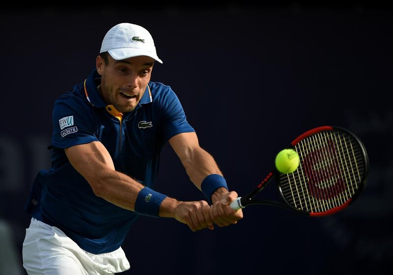 DUBAI, UNITED ARAB EMIRATES - FEBRUARY 28:  Roberto Bautista Agut of Spain plays a forehand during his match against Pierre-Hugues Herbert of France on day three of the ATP Dubai Duty Free Tennis Championships at the Dubai Duty Free Stadium on February 28, 2018 in Dubai, United Arab Emirates.  (Photo by Tom Dulat/Getty Images)