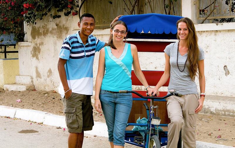 Monja Wolf, right, the founder of Monyati Initiatives, with Sophie Benbow and Gildas Andiramalala, members of the organisation's team in Madagascar. Photo courtesy of Amelia Johnson