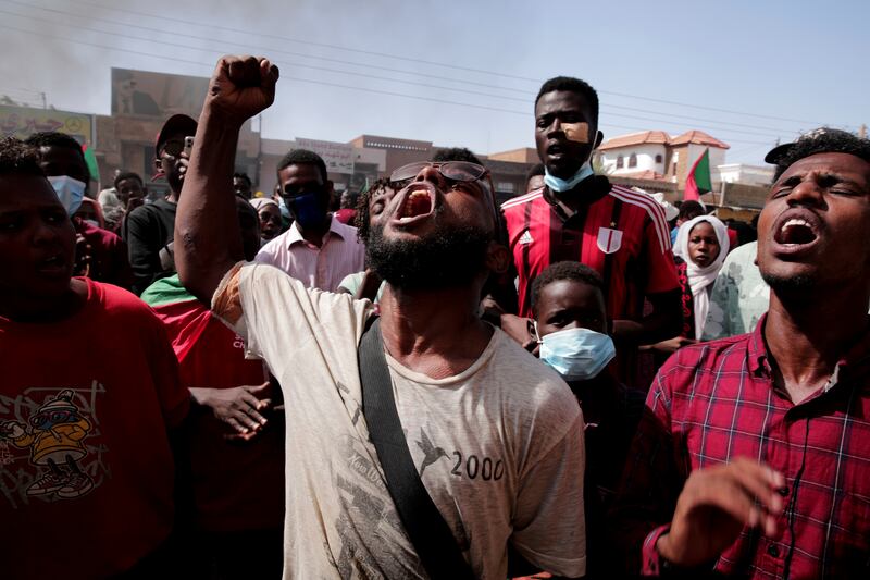Demonstrators gather in Sudan's capital Khartoum to protest against the October 2021 military takeover. AP