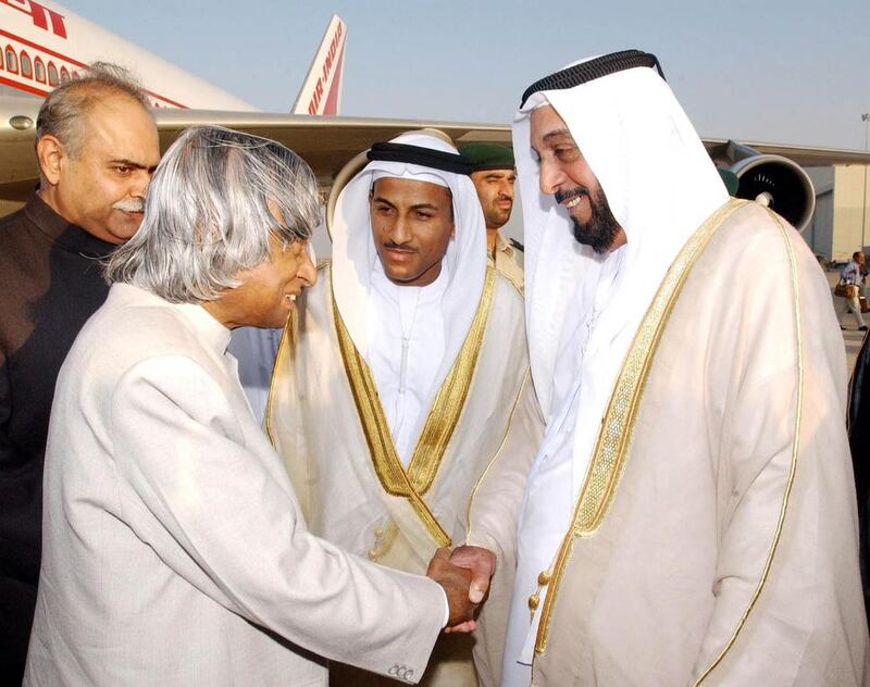 Sheikh Khalifa, then Crown Prince of Abu Dhabi, welcomes former Indian president APJ Abdul Kalam on his arrival at Abu Dhabi airport for a three-day visit. Mr Kalam was the first Indian head of state to visit the UAE in 25 years. AFP Photo / Wam