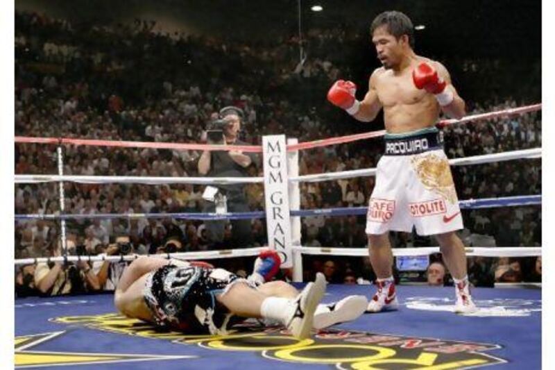 Ricky Hatton is knocked down and defeated by a TKO in the second round by Manny Pacquiao in their 2009 Super Lightweight World championship bout. 

STEVE MARCUS / REUTERS