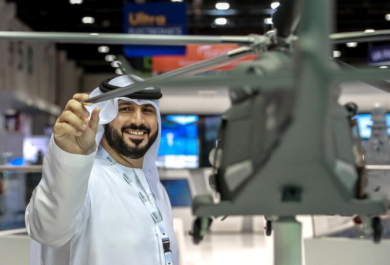 Abu Dhabi, U.A.E., February 17, 2019. INTERNATIONAL DEFENCE EXHIBITION AND CONFERENCE  2019 (IDEX) Day 1-- An Idex visitor checks out the AW149 Multi-Mission Performance helicopter.
Victor Besa/The National
Section:  NA
Reporter:  Dania Saadi
