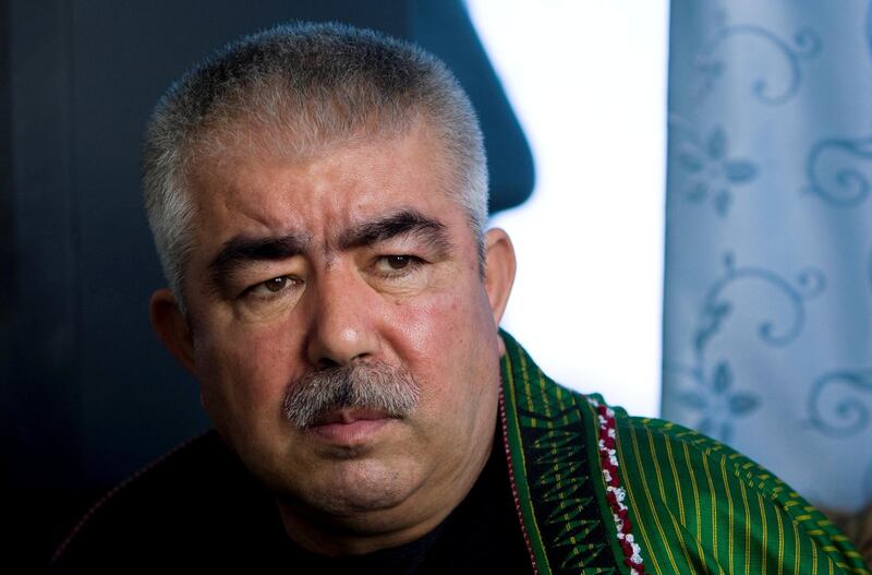 FILE PHOTO: Afghan General Abdul Rashid Dostum speaks during an interview with Reuters at his Palace in Shibergan, in northern Afghanistan August 19, 2009. REUTERS/Caren Firouz/File Photo
