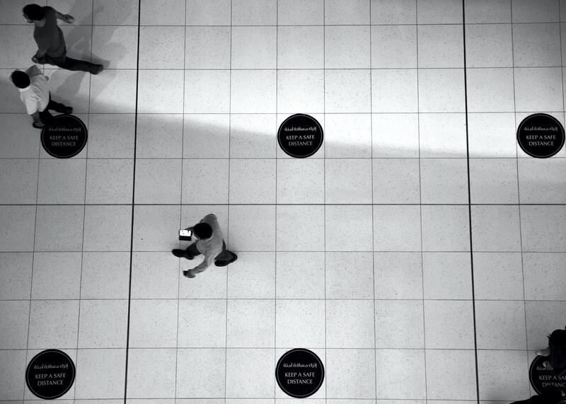 DUBAI, UNITED ARAB EMIRATES. 11 JUNE 2020. 
Signs requiring people to social distance at Dubai Mall’s Dubai Aquarium and Underwater Zoo
(Photo: Reem Mohammed/The National)

Reporter:
Section: