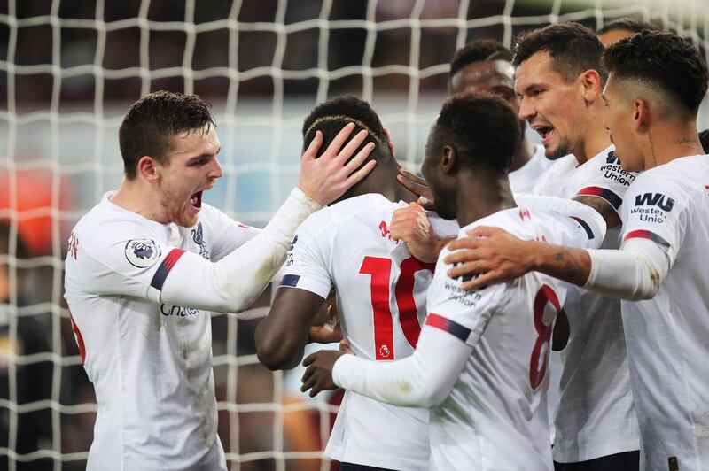 BIRMINGHAM, ENGLAND - NOVEMBER 02:  Sadio Mane of Liverpool celebrates with Andy Robertson and teammates after scoring his team's second goal during the Premier League match between Aston Villa and Liverpool FC at Villa Park on November 02, 2019 in Birmingham, United Kingdom. (Photo by Marc Atkins/Getty Images)