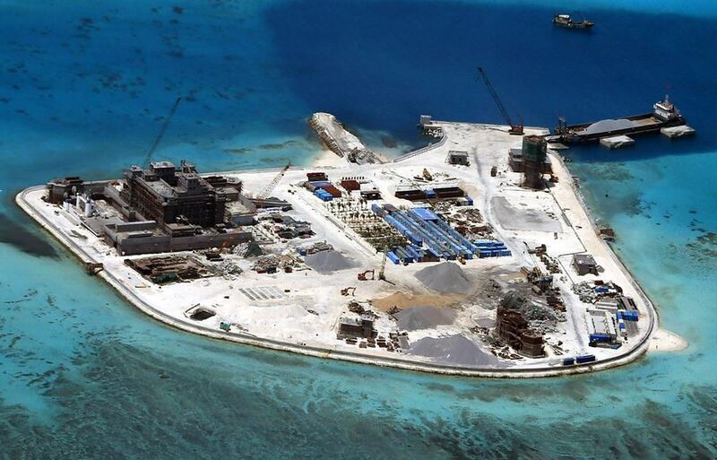 An aerial view of construction at Mabini (Johnson) Reef by China, in the disputed Spratly Islands. China has reportedly deployed two batteries of surface-to-air missile launchers to Woody Island in the island chain in the South China Sea, according to satellite imagery from ImageSat International. Armed Forces of the Philippines / EPA