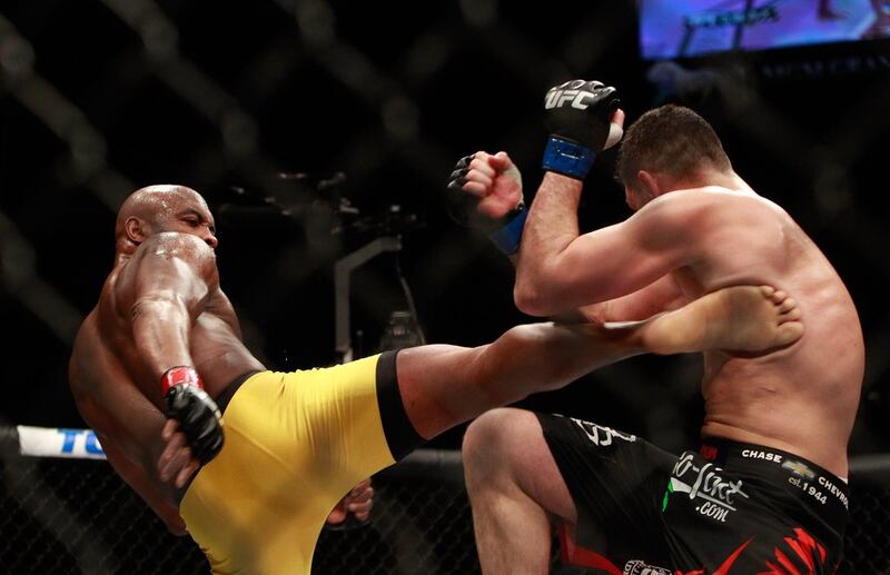 Anderson Silva kicks Nick Diaz during their main bout at UFC 183, which Silva won with a unanimous decision. Steve Marcus / Getty Images / AFP