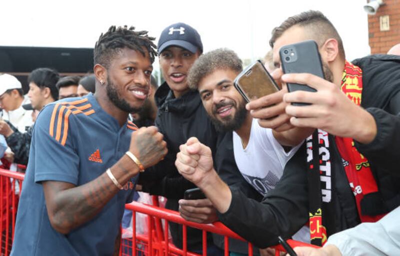 Fred looks happy ahead of the Liverpool clash. Getty