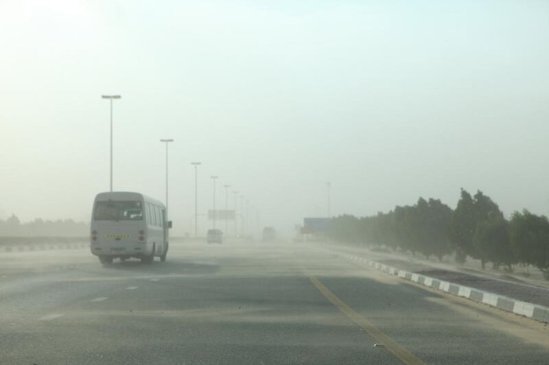 Low visibility due to dust and sand being picked up by the fresher air will make driving conditions potentially hazardous, according to weather forecasters. Fatima Al Marzooqi/The National