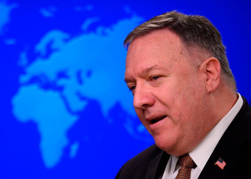 (FILES) In this file photo taken on March 25, 2020, US Secretary of State Mike Pompeo speaks during a press conference at the State Department in Washington, DC. The US on December 15, 2020, placed a pro-Iranian group based in Bahrain on its global "terror list," accusing it of plotting attacks on US troops in the tiny Gulf kingdom. The group, Saraya al-Mukhtar, poses a "significant risk of committing acts of terrorism that threaten the national security and foreign policy of the United States,"  Pompeo said in a statement. / AFP / ANDREW CABALLERO-REYNOLDS
