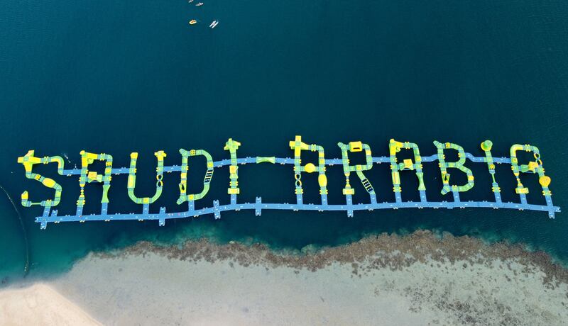 A picture shows a floating blow-up water park that spells "Saudi Arabia" in English letters, at Pure Beach in King Abdullah Economic City, about 125 kilometers south of Jeddah's city centre, on the Red Sea. Saudi Arabia is investing heavily to boost the tourism sector. Photo by Fayez NURELDINE  /  AFP